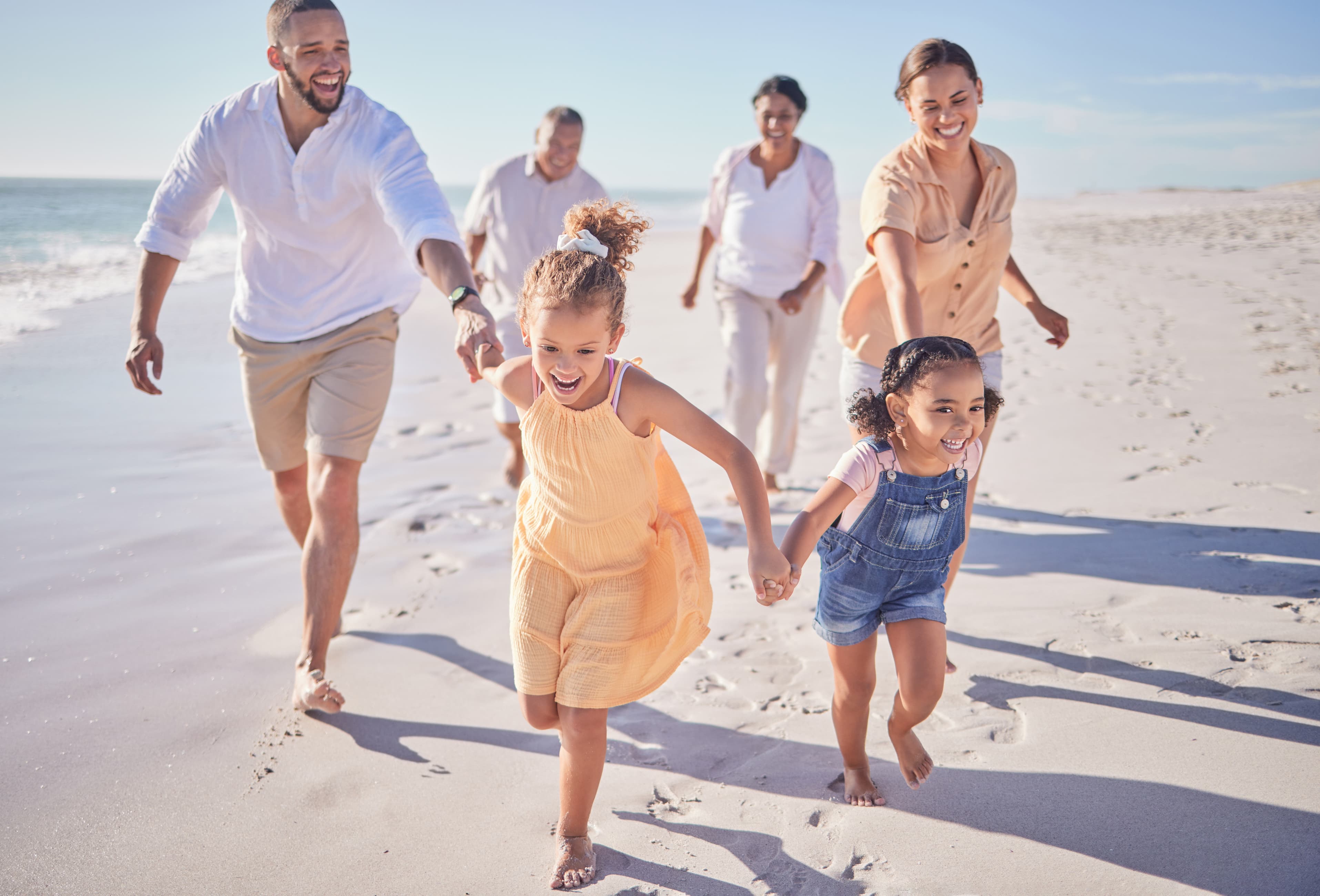 Family enjoying time together on the beach